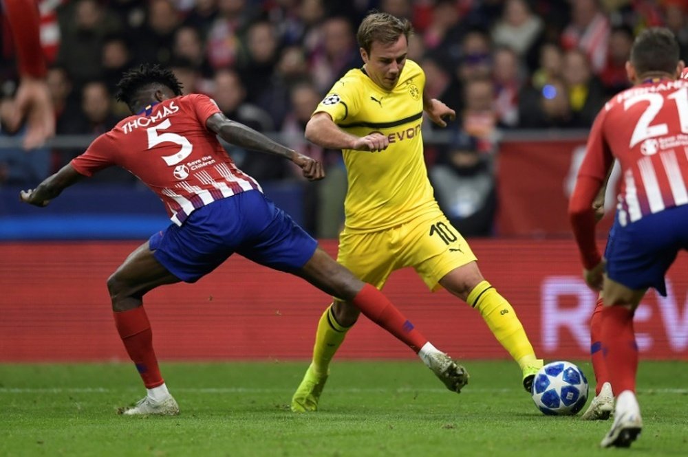 Foto de arquivo de duelo entre Dortmund e Atlético. AFP